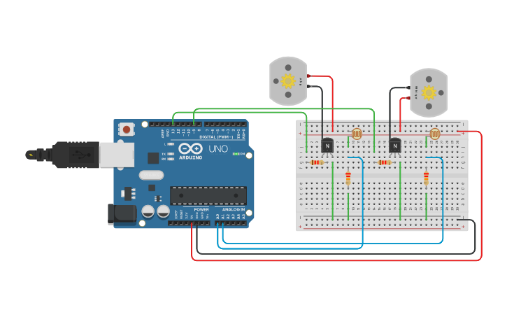 Circuit design Two Light sensors working with two motors - Tinkercad