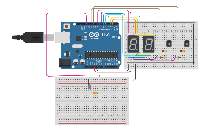 Circuit design Contador 0-99 con multiplexación Y LED - Tinkercad