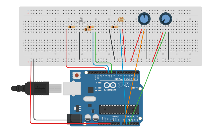 Circuit design Led RGB, 2 potenciómetros y un LDR | Tinkercad