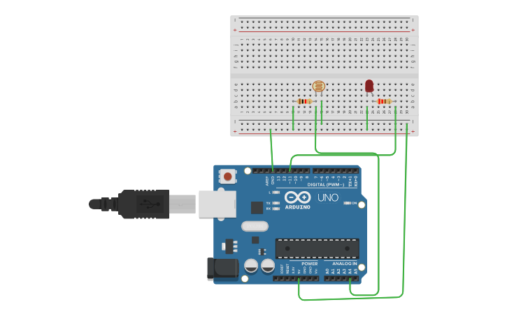 Circuit design Controlling the intensity of LED using LDR - Tinkercad