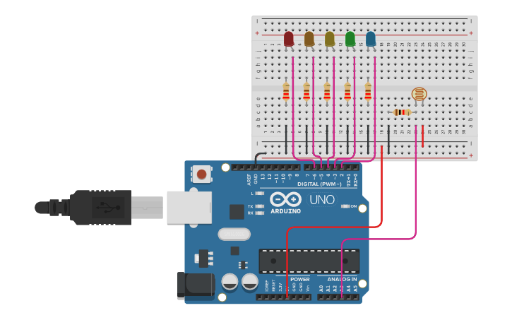 Circuit design Sensor LDR y leds | Tinkercad